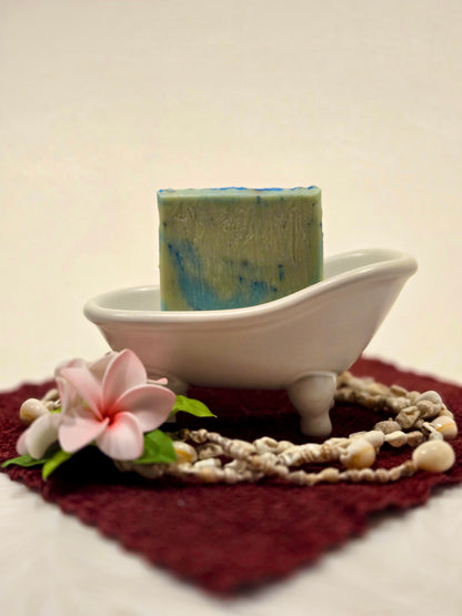 coconut beach club cold process soap bar made with olive oil, coconut oil, and castor oil.
