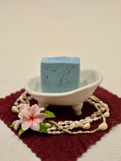 paradise breeze cold process soap bar made with olive oil, coconut oil, and castor oil.
